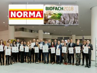 Das NORMA-Management auf der Messe BIOFACH 2018 u.a. mit den Vorständen Gerd Köber (vordere Reihe, sechster von links) sowie Robert Tjón (vordere Reihe, fünfter von rechts.), Foto: NORMA